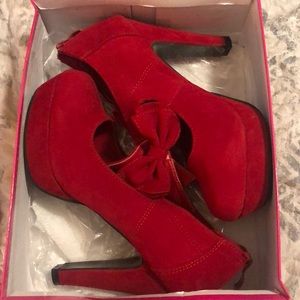 Red suede high heels